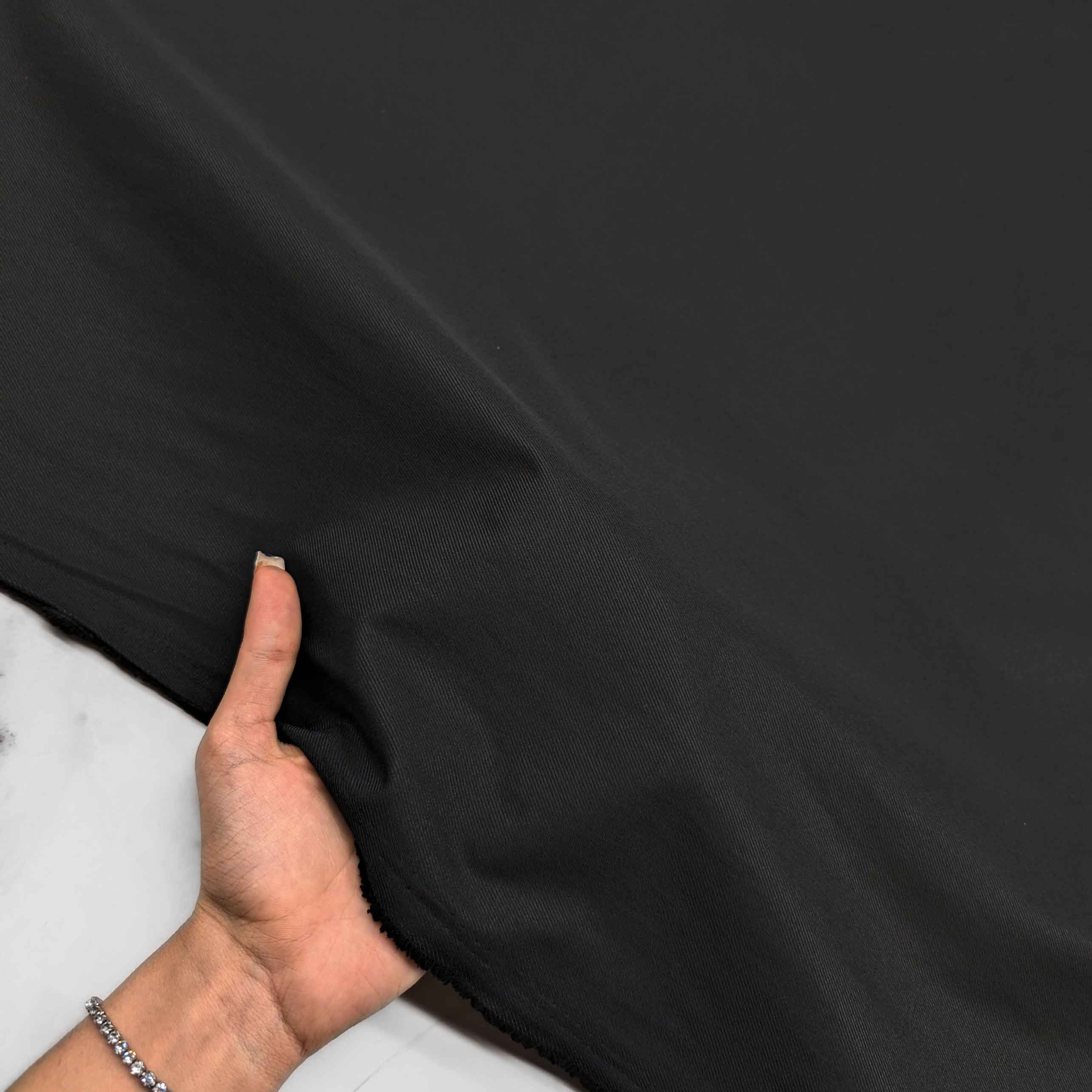 پارچه کتان کجراه بارانی رنگ مشکی 