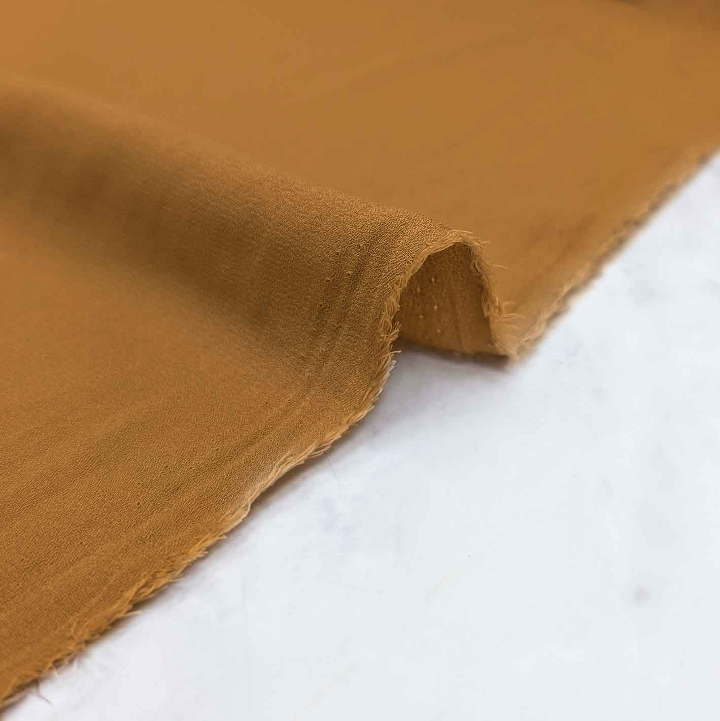 پارچه کرپ حریر ساده رنگ خردلی 