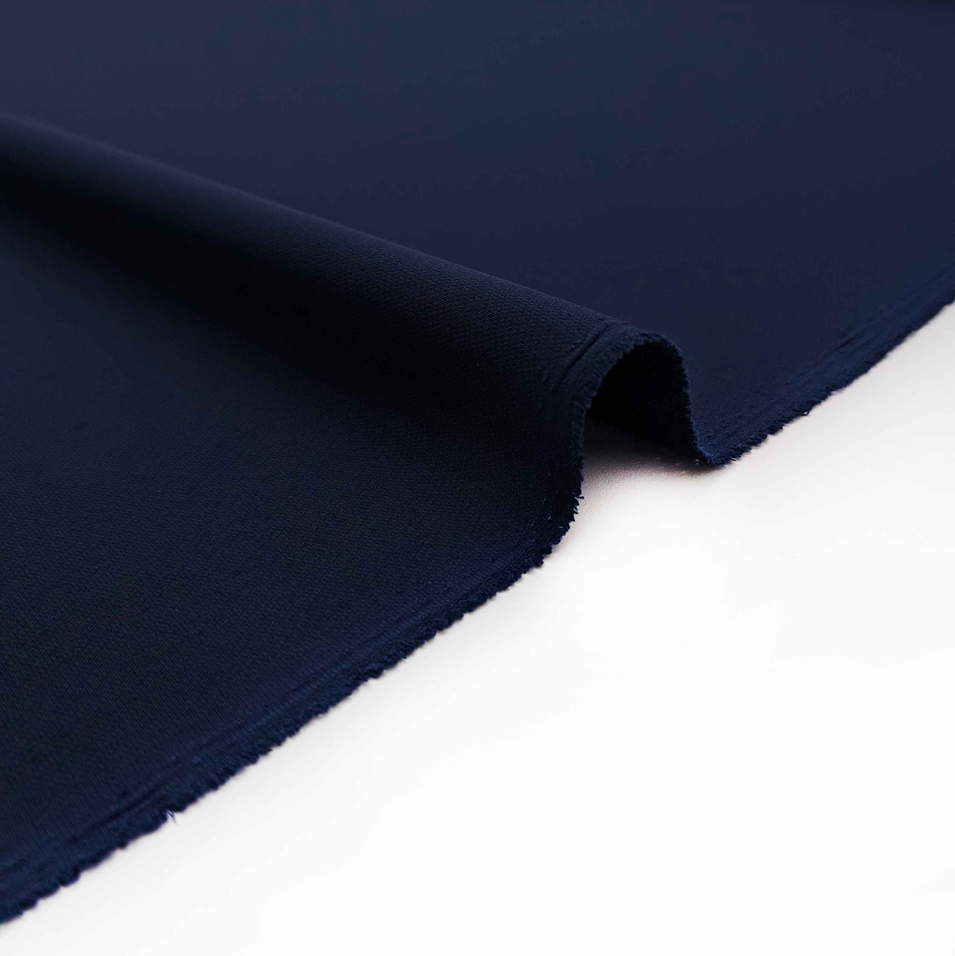 پارچه کرپ رویال کنزو رنگ سرمه ای سوخته 59 