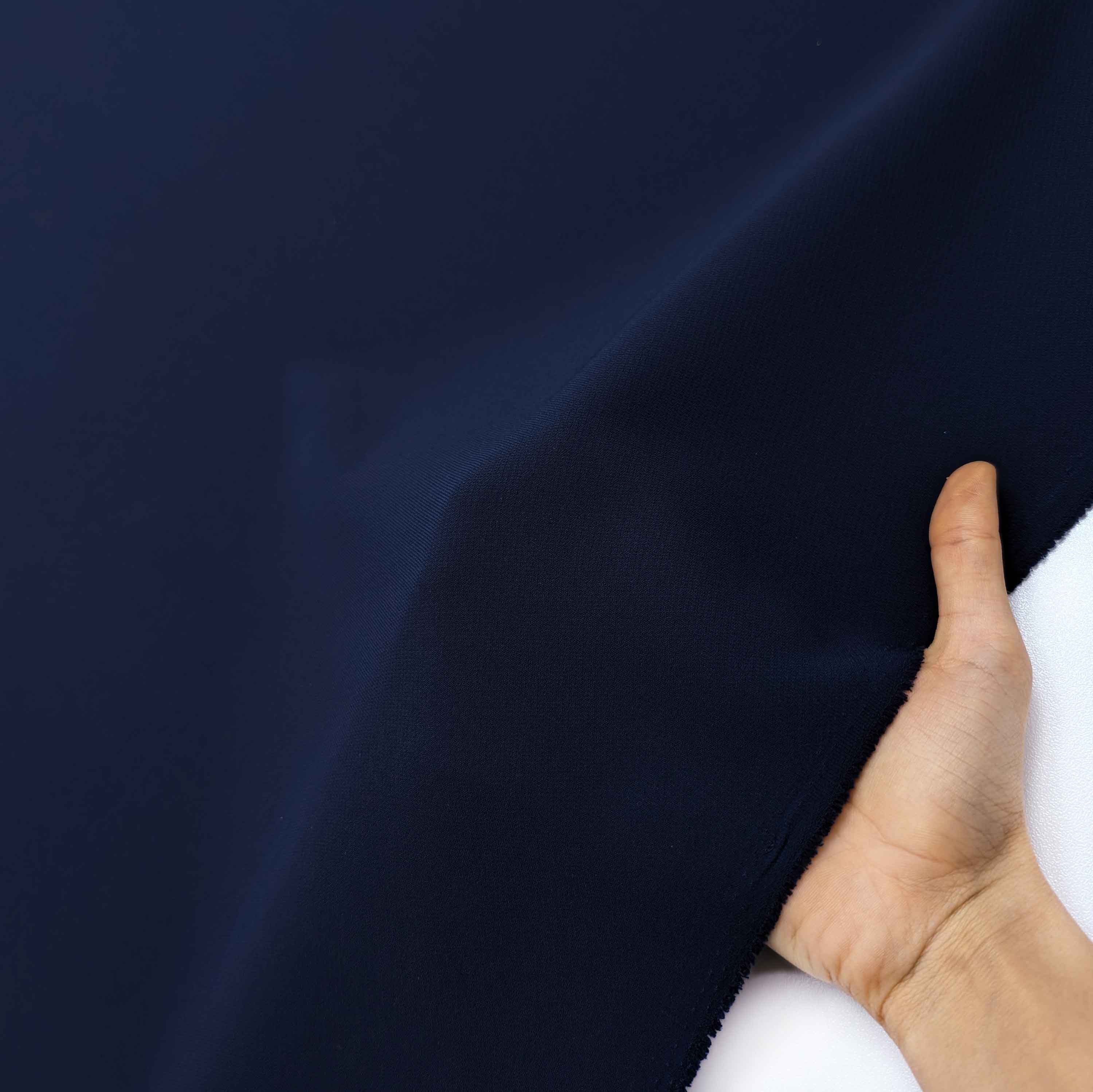 پارچه کرپ رویال کنزو رنگ سرمه ای سوخته 59 