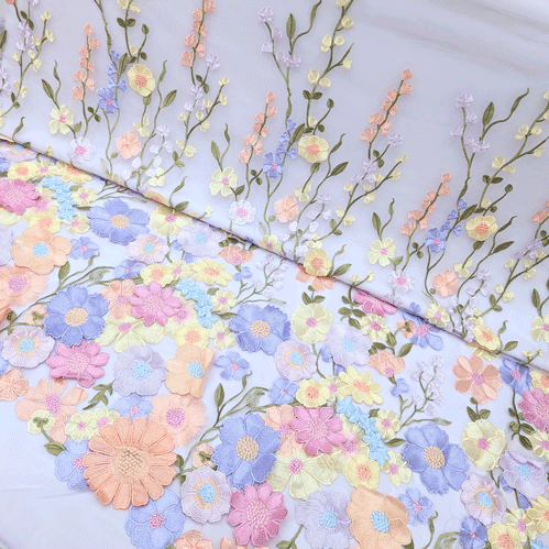 پارچه تور گلدوزی رنگ زمینه یاسی روشن 